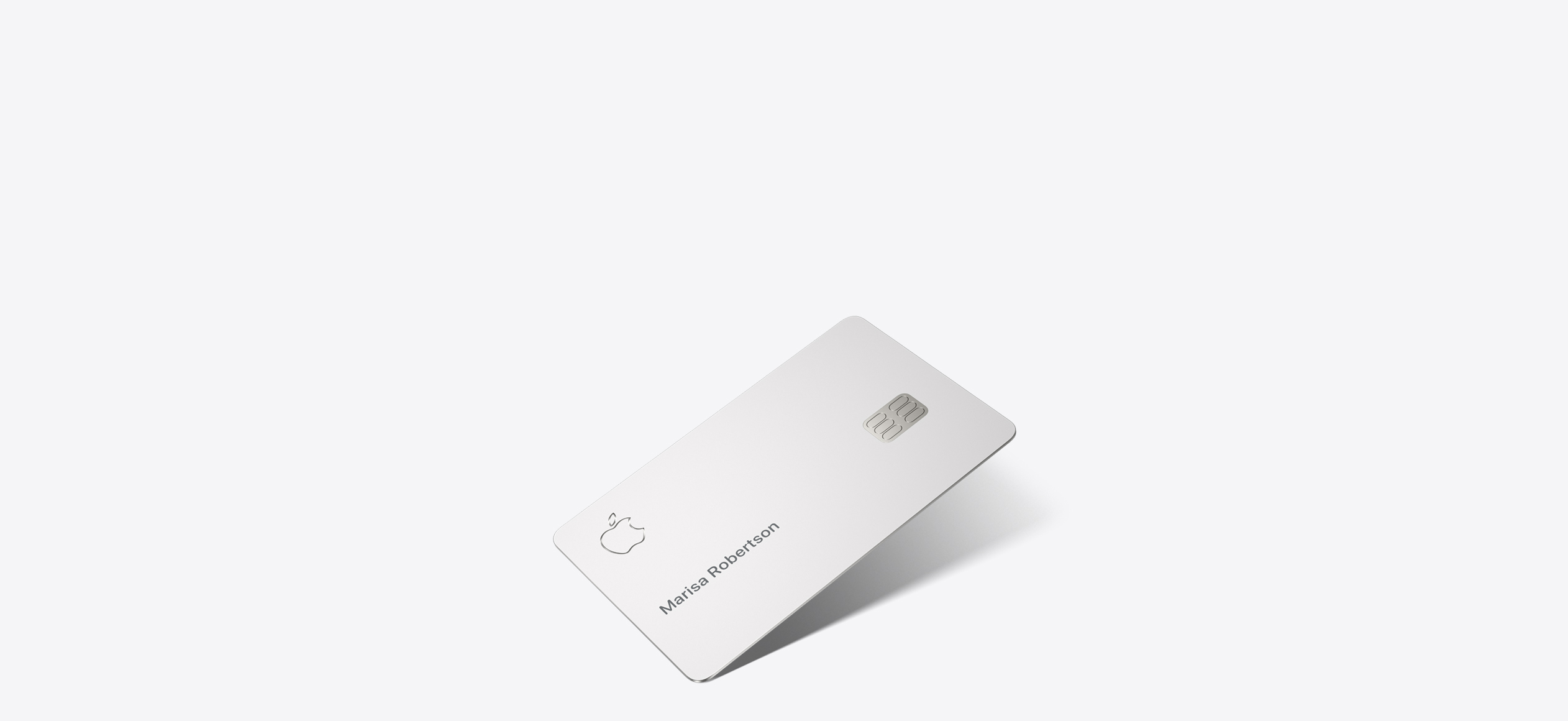 Apple Card, front, Apple logo in top left, cardholder name in middle left Marisa Robertson, card chip in middle right.