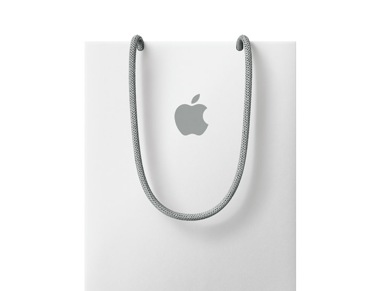 Apple shopping bag in white color with Apple Logo near top