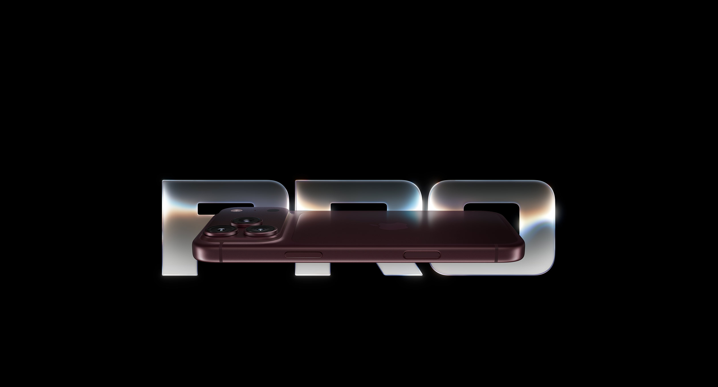 iPhone 18 Pro, partial side view, burgundy color, featuring a camera system with three lenses in the top left corner, flash and microphone, Apple logo in the middle, action and volume button featured slides over a giant text saying PRO